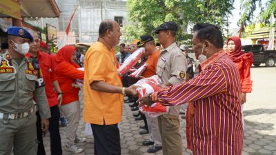Plt Bupati Langkat Bagikan 10 Juta Bendera Merah Putih
