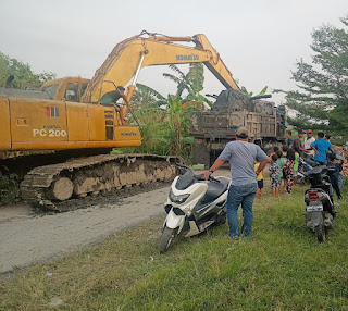 Sampah di Parit Penyebab Banjir di Desa Saentis