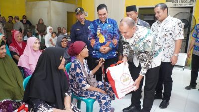 Pj Bupati Langkat Serahkan 122 Paket Sembako Bantuan Presiden 
